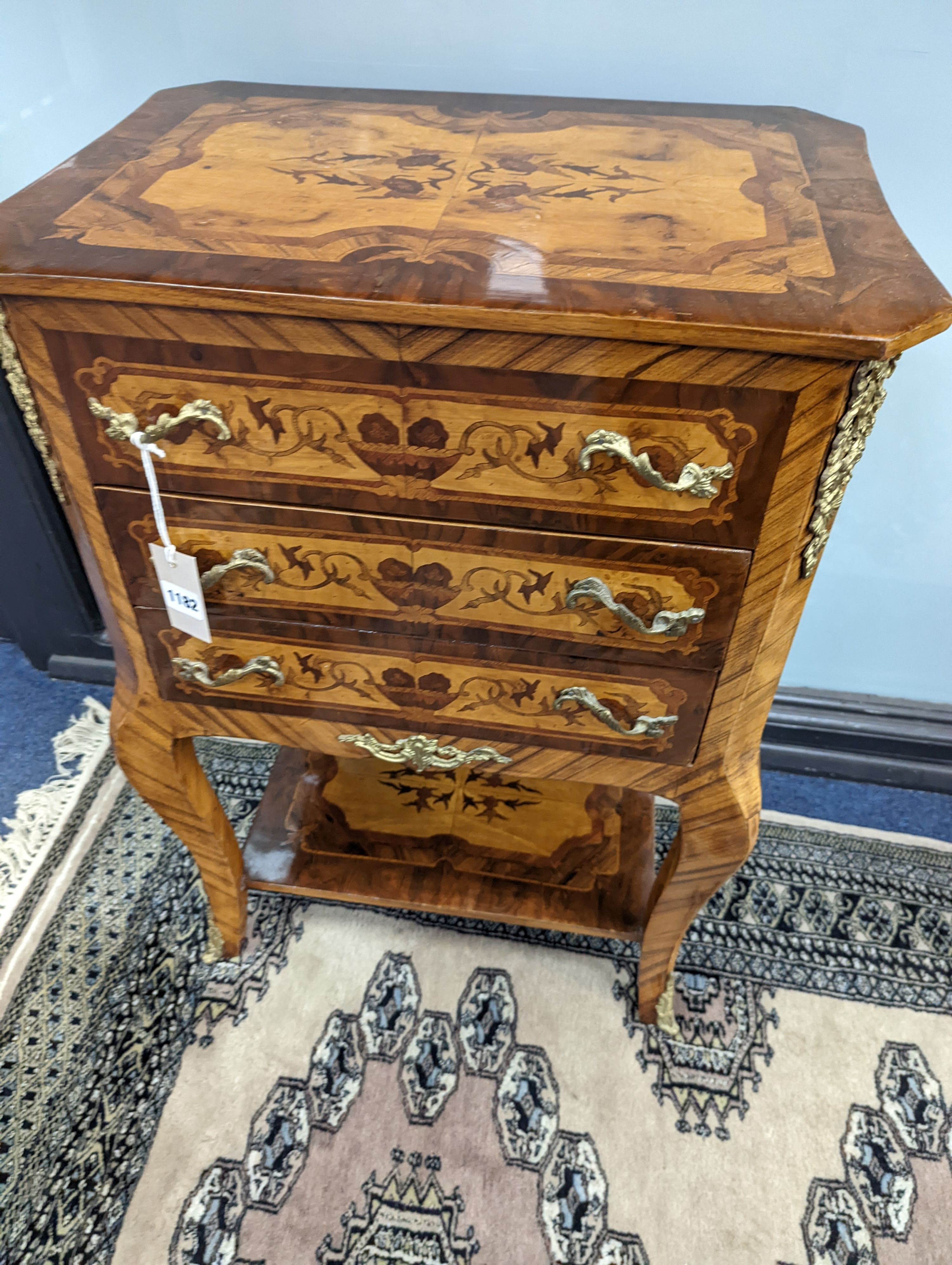 A pair of Louis XVI style marquetry bedside chests, each fitted with a two side drawers above two front long drawers, width 53cm, height 75cm